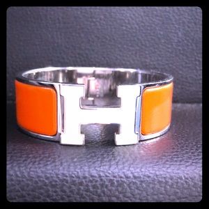 Hermès Orange and White bracelet.